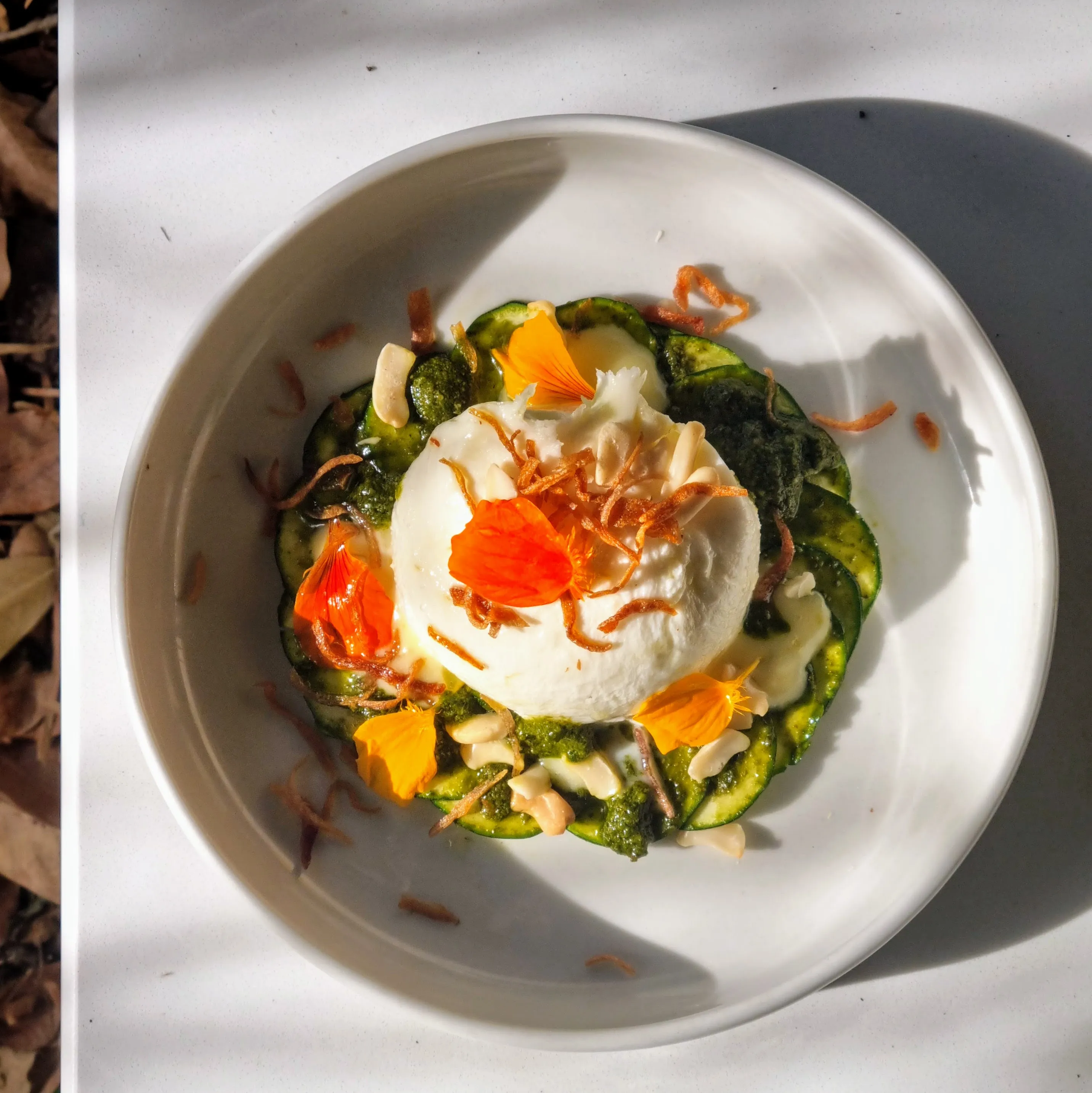 Zuchinni Carpacio, Burata, Pesto, Lemon Emulsion, Marula Nuts, Crispy Shallots